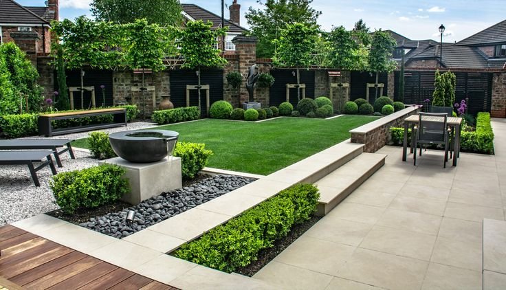 Reference: circular concrete pads and rock compositions with plantings